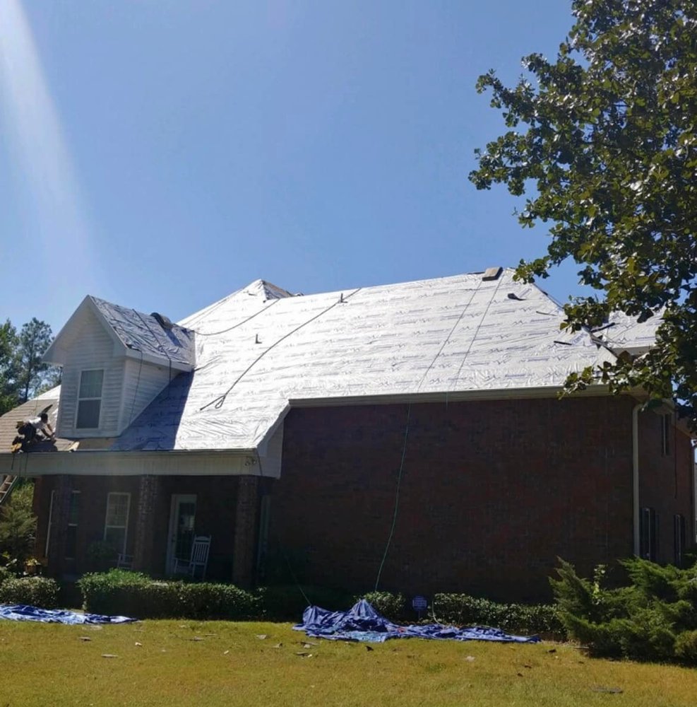 Slide of Farr Roofing