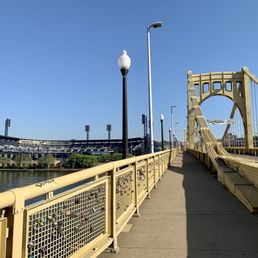 At the end of the bridge.