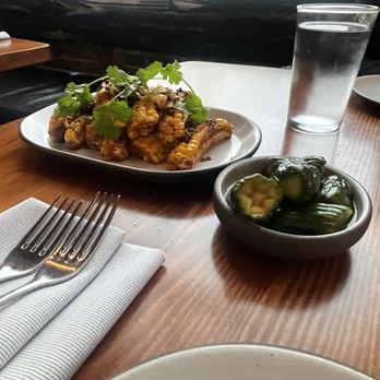 Current Charcoal Grill - Corn ribs and pickled cucumbers - Asian Fusion Near Me - Birmingham, Alabama Current Charcoal Grill - Corn ribs and pickled cucumbers - Asian Fusion Near Me - Birmingham, Alabama