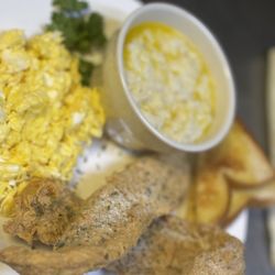 Dessence Cafe - Catfish meal eggs grits & toast