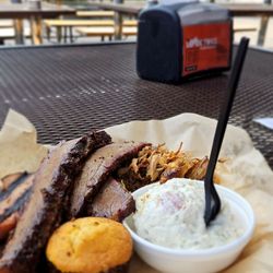 The Shed Smokehouse & Juke Joint - Sampler Plate with brisket, pulled pork, pulled chicken and bologna. Every single meat was dry and overcooked.