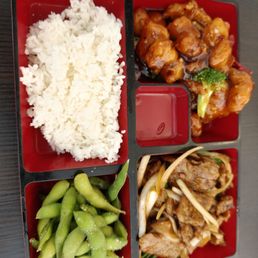 Bento box with generals chicken and mongolian beef. Bento box with generals chicken and mongolian beef.