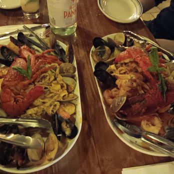 Porto Salvo - Seafood platter (mussels, calamari, and lobster) - Italian Near Me - Bronx, New York Porto Salvo - Seafood platter (mussels, calamari, and lobster) - Italian Near Me - Bronx, New York
