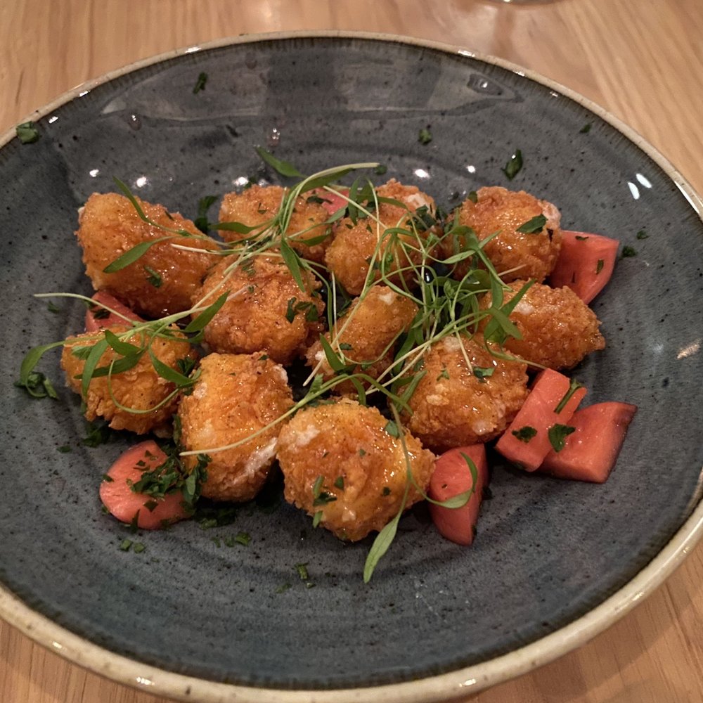 Cadre Restaurant - Fried goat chèvre cheese curds. - French Near Me - Madison, Wisconsin Cadre Restaurant - Fried goat chèvre cheese curds. - French Near Me - Madison, Wisconsin