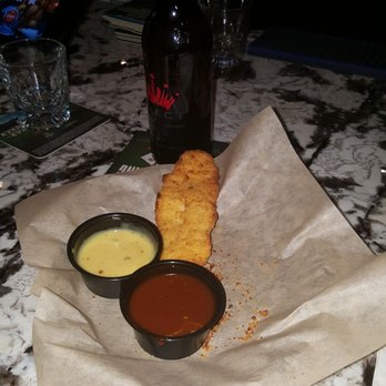 Renie's Lounge - Chicken tenders, almost all done..comez with 4 and 1 sauce..customer said they were goooood! - Sports Bars Near Me - Columbus, Ohio