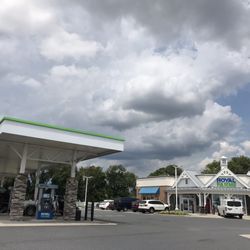 Royal Farms - First line of gas pumps and storefront.