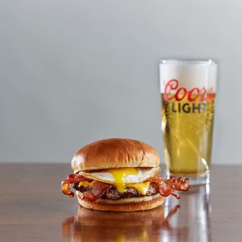 The Bar - The Avenue - a bacon and egg sandwich with a glass of beer - Sports Bars Near Me - Appleton, Wisconsin