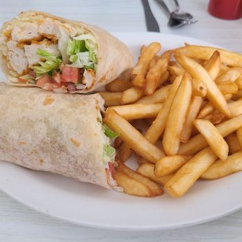 Sunset Inn Restaurant - Crispy chicken wrap and fries - Breakfast & Brunch Near Me - Amboy, Illinois Sunset Inn Restaurant - Crispy chicken wrap and fries - Breakfast & Brunch Near Me - Amboy, Illinois