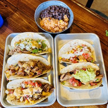 Green Lemon - The street trio tacos with the Shia labeef, americano, kft, plus two extra tacos carnitas, and cerdo perfecto. Side of rice and beans. - Mexican Near Me - Tampa, Florida Green Lemon - The street trio tacos with the Shia labeef, americano, kft, plus two extra tacos carnitas, and cerdo perfecto. Side of rice and beans. - Mexican Near Me - Tampa, Florida