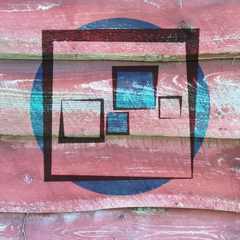 Blocks And Spots - a pink building with a blue circle - General Contractors Near Me - Charlton, Massachusetts