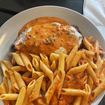 The Social - Chicken parmigiana with pink vodka sauce - Pasta Shops Near Me - North Providence, Rhode Island The Social - Chicken parmigiana with pink vodka sauce - Pasta Shops Near Me - North Providence, Rhode Island
