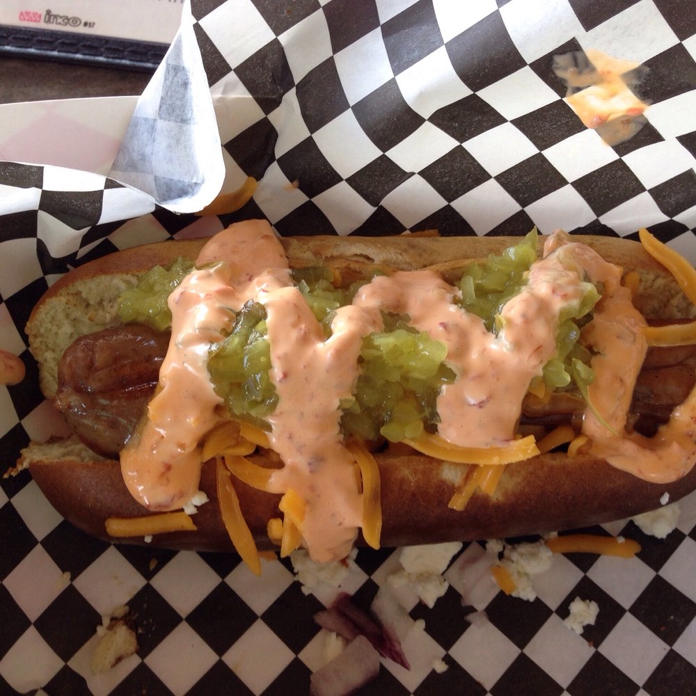 Moon Tower - Duck hotdog with vino and foie gras with Chef's dressings - Dive Bars Near Me - Houston, Texas