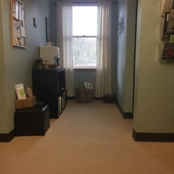Wildflowers Chiropractic - Waiting area.  Water/tea and toys for the kids.