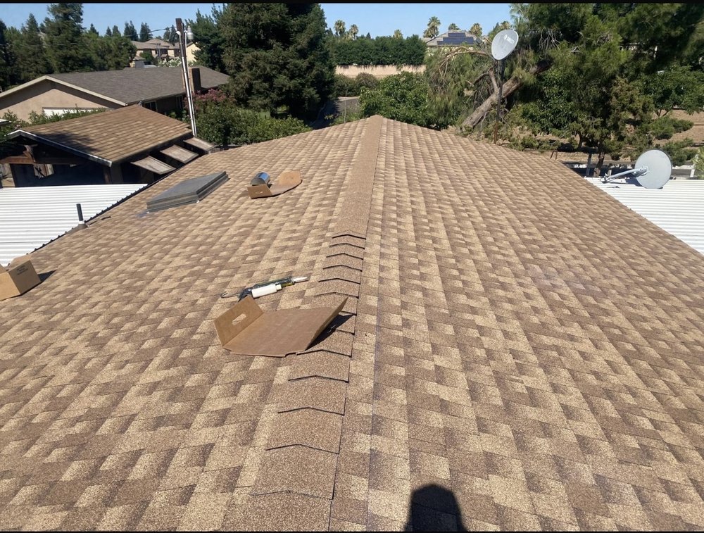 Slide of TAAG Roofing