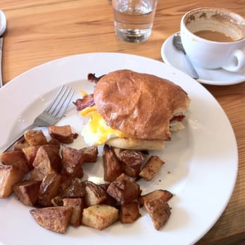 Half & Half - Fried egg sandwich. Couldn't help the bite. - Breakfast & Brunch Near Me - St. Louis, Missouri