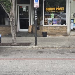 Paper bag that isn't even covered filled with bread left on the sidewalk. To be used the next day.