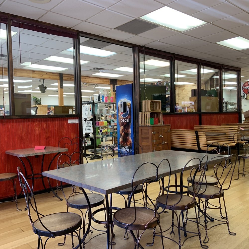 Red table hats denote closed tables during COVID distancing Red table hats denote closed tables during COVID distancing
