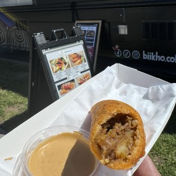 Biikho Colombian Food - Arepa de carne - mixed in with that dip it was pure - Colombian Near Me