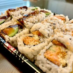 Kuma Ramen - Eel roll and spicy salmon roll: simple and delicious. I always order extra spicy mayo for dipping