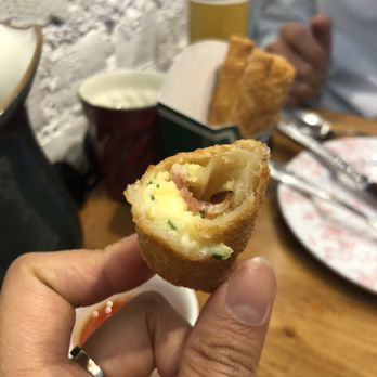 Olmsted - Inside of the EGG ROLLS. Eggs, bacon and cheese. - New American Near Me - Brooklyn, New York