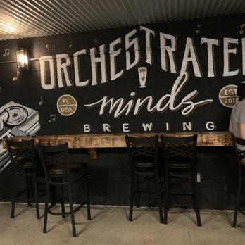 Orchestrated Minds Brewing - a man sitting at a bar - Breweries Near Me - Fort Lauderdale, Florida Orchestrated Minds Brewing - a man sitting at a bar - Breweries Near Me - Fort Lauderdale, Florida