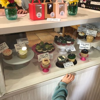 Ida's Cupcake Cafe - Cupcakes in display case. (Some of the cupcakes displayed were not available.) - Cupcakes Near Me - Bend, Oregon