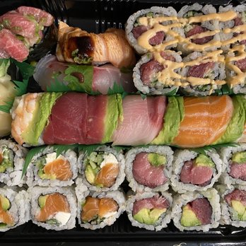 Ebi Sushi Bar - Rainbow Roll, Spicy Tuna with Cucumber Roll, Philadelphia Roll, Torched Salmon Belly - Sushi Bars Near Me - Somerville, Massachusetts