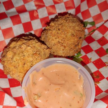 Mudbugs Cajun Icehouse - Boudain balls, what was left of the 6 they gave us. Slightly spicy and great flavor! - Cajun/Creole Near Me - Corpus Christi, Texas