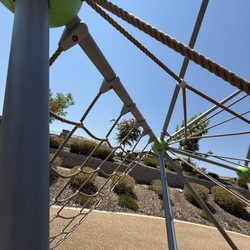 Gum Ranch Park - Hard to see but there is a big gap between the older kids climbing structure and the rope bridge you have to crawl over to get to slide.