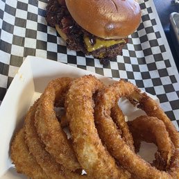 BBQ Smashburger  (BBQ Sauce, Onion rings, bacon) with onions rings