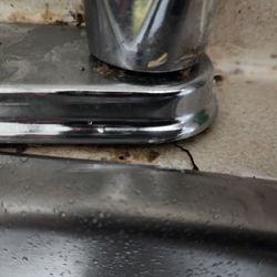 Mainstreet Equity | Regina Apartments - Kitchen counter falling apart