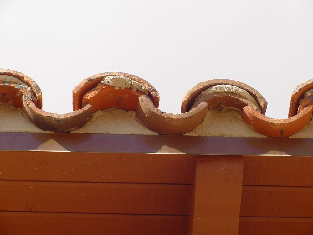 Slide of Valencia Roofing Company