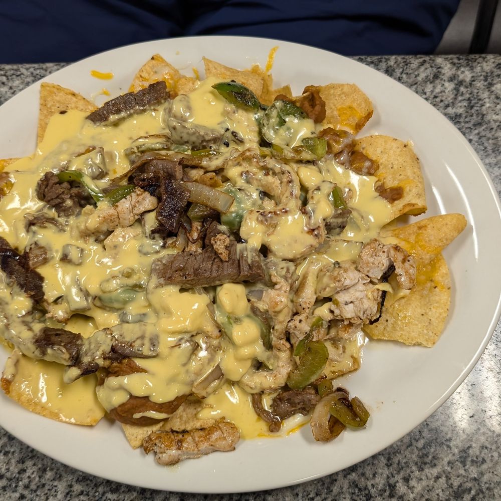 New Rodeo Mexican Grill - Rodeo Fajita Nachos - Mexican Near Me - Gatesville, Texas New Rodeo Mexican Grill - Rodeo Fajita Nachos - Mexican Near Me - Gatesville, Texas