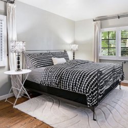 Gold Standard Estate Sales - Charles P Rogers wrought iron bed, tables, lamps
