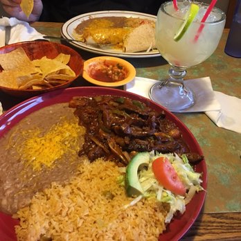 El Indio's - Arroz con pollo special and margarita, far plate is a enchilada and Taco. Perfect - Mexican Near Me - Portland, Oregon