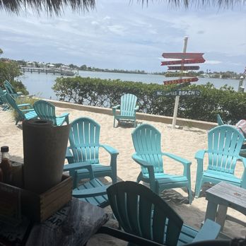 Nokomo's Sunset Hut - Outside sitting. - Seafood Near Me - Nokomis, Florida Nokomo's Sunset Hut - Outside sitting. - Seafood Near Me - Nokomis, Florida