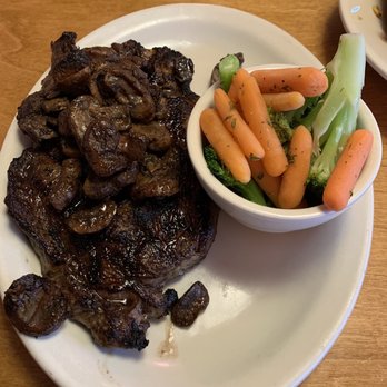 Texas Roadhouse - Rib-eye with sautéed mushrooms and a side of steamed veggies - Steakhouses Near Me - Chantilly, Virginia Texas Roadhouse - Rib-eye with sautéed mushrooms and a side of steamed veggies - Steakhouses Near Me - Chantilly, Virginia