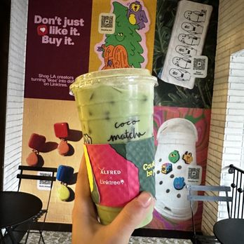 Alfred Coffee - The iced coconut matcha latte in front of their cute mural - Coffee & Tea Near Me - Studio City, California