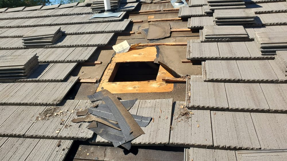 Slide of White River Roofing