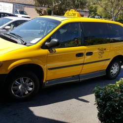 Yellow Cab Company - The driver of this cab was not picking up or dropping off anyone. She was just sitting in the cab for thirty minutes...in a handicap zone.