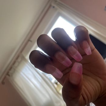 Sarah's Nail & Spa - You can see my nail underneath the PINK nail color cause she didn't put a nude base coat at all. - Nail Salons Near Me - Seattle, Washington