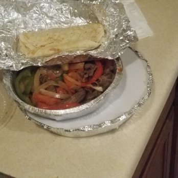 Cancun Mexican Restaurant - a plate of food on a counter - Mexican Near Me - Cincinnati, Ohio