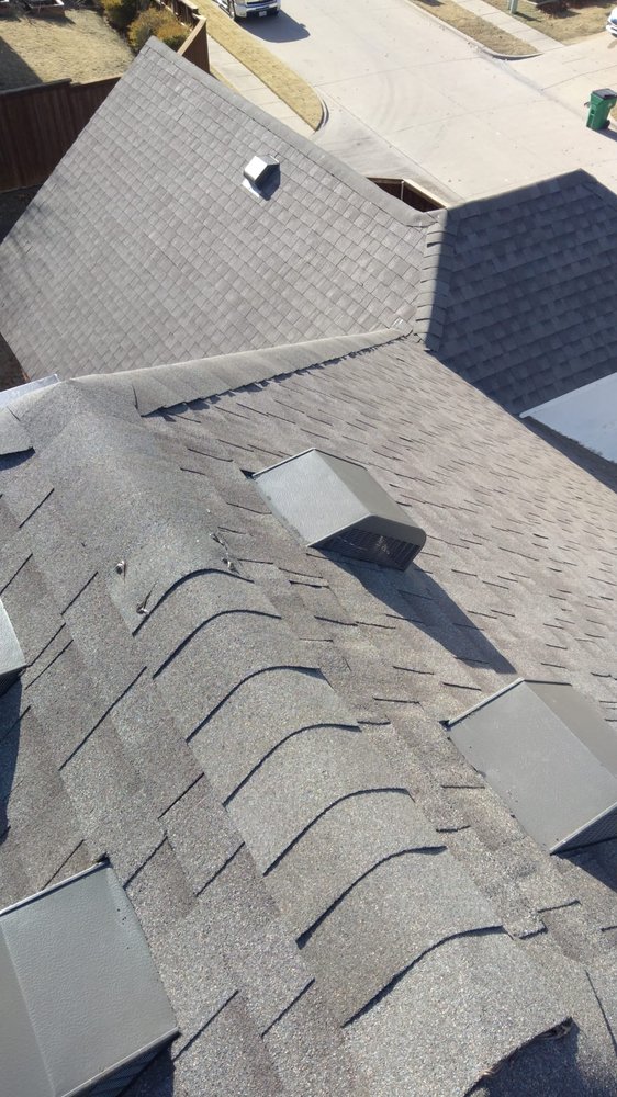 Slide of LTZ Roofing Pros