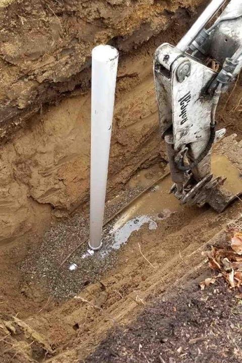 Slide of Suburban Sewer & Septic