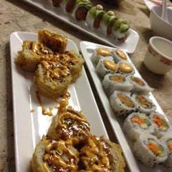 Love Sushi - Yum yum. nicely presented! We got the Chicken cheese roll for kicks and it was weird, as expected :)