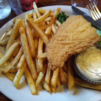 Trainwreck Saloon - Catfish and fries (comes with 2 pieces) - Sports Bars Near Me - Saint Louis, Missouri Trainwreck Saloon - Catfish and fries (comes with 2 pieces) - Sports Bars Near Me - Saint Louis, Missouri