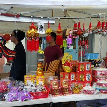 Chinatown - Trinkets and shirts year of the monkey - Local Flavor Near Me - Honolulu, Hawaii