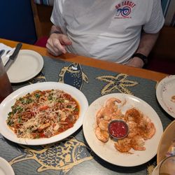 Shells of Melbourne - Calimari in red sauce, peel shrimp