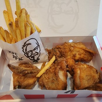 KFC - a box of fried chicken and french fries - Chicken Wings Near Me - Vaughan, Ontario KFC - a box of fried chicken and french fries - Chicken Wings Near Me - Vaughan, Ontario