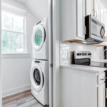The One Clemson by Asset Living - Laundry room with stackable washer and dryer - Apartments Near Me - Clemson, South Carolina The One Clemson by Asset Living - Laundry room with stackable washer and dryer - Apartments Near Me - Clemson, South Carolina